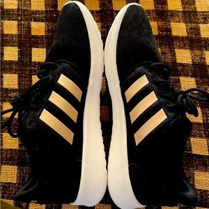 Women’s Adidas athletic shoes.